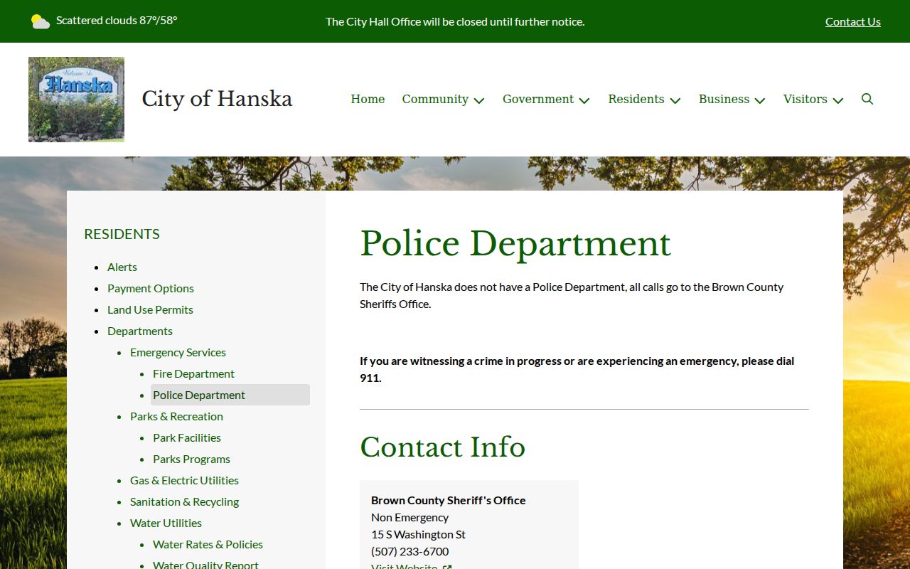 Hanska official city page directing police calls to the Brown County Sheriff for Hanska warrant records